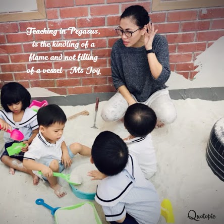 Pegasus children exploring inquiry-based learning materials in the Reggio Emilia classroom