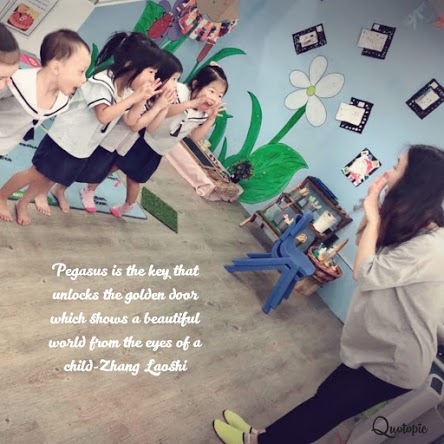 A diverse group of Pegasus International Preschool children together